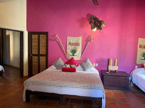 Кровать или кровати в номере Hotel Artesanal