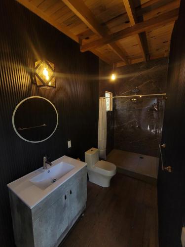 Ванная комната в Cabañita Alpina para Parejas