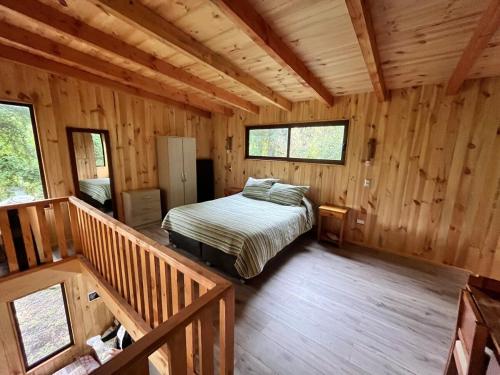 Postel nebo postele na pokoji v ubytování Cabin in Pucón