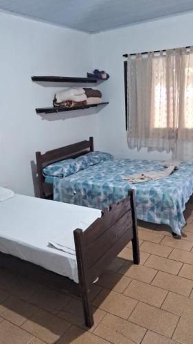 Postel nebo postele na pokoji v ubytování Camping Internacional