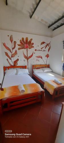 Postel nebo postele na pokoji v ubytování hostal posada san jose