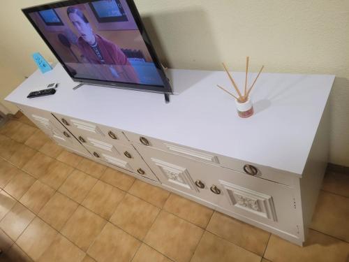 Et tv og/eller underholdning på Apartamento Montserrat