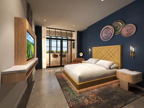 Un ou plusieurs lits dans un hébergement de l'établissement Hard Rock Hotel London Ontario