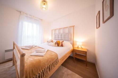 Katil atau katil-katil dalam bilik di Magnifique Logement 6 pers Near Basel Parking Wifi