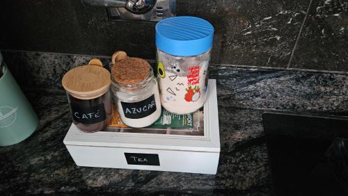 a box with three different types of food in it at Apartamento zona Norte Ucebol in Santa Cruz de la Sierra