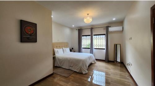 Postel nebo postele na pokoji v ubytování Marblearch Apartment
