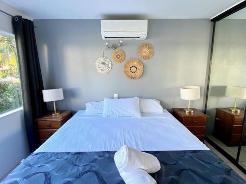 Cama o camas de una habitación en Reef Gateway Apartments
