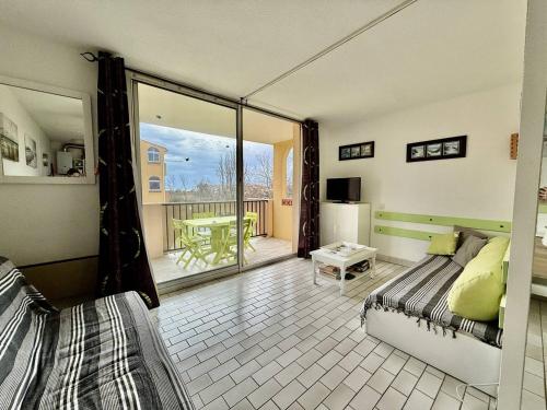 Photo de la galerie de l'établissement Studio cabine proche plage, piscine, parking à Cap d'Agde - FR-1-723-173, au Cap d'Agde