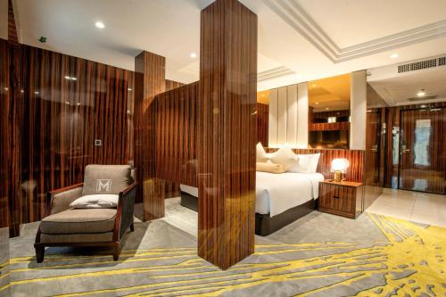 Postel nebo postele na pokoji v ubytování Moty Hotel