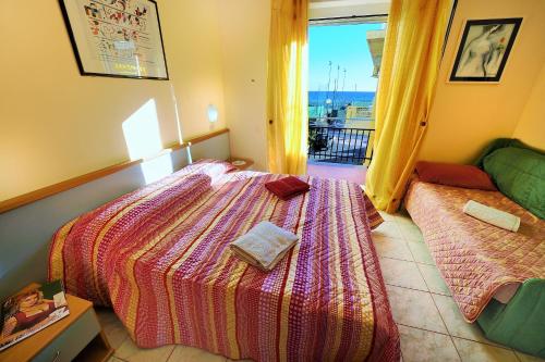 Säng eller sängar i ett rum på Hotel Lucerna