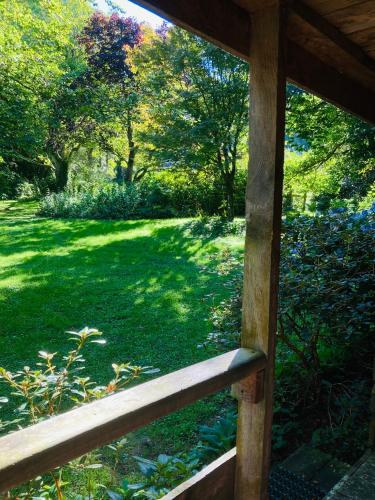 a view of a yard with trees and grass at Waikonini Homestead in Geraldine