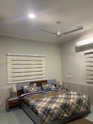 Katil atau katil-katil dalam bilik di Two Bedroom Apartment