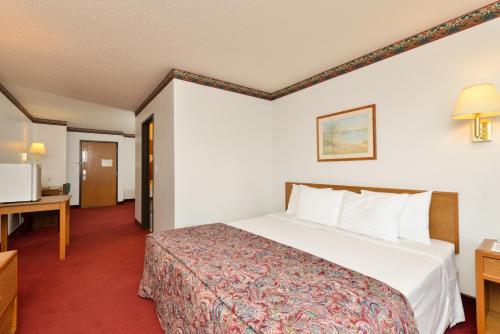 Ένα ή περισσότερα κρεβάτια σε δωμάτιο στο Americas Best Value Inn & Suites Clear Lake