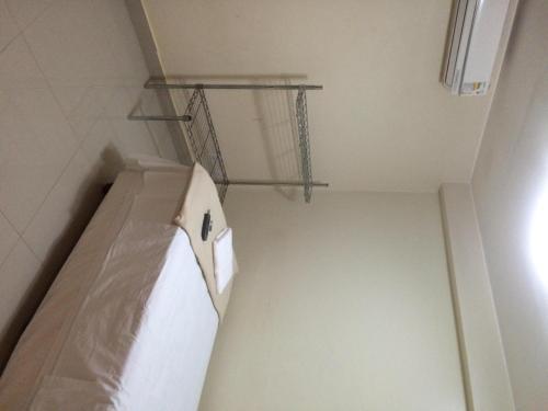 a small bathroom with a toilet in a room at Pousada Verdes Flores in Brasilia