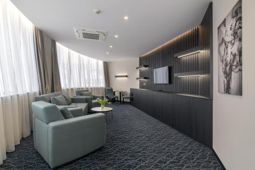 Coin salon dans l'établissement Rosslyn Dimyat Hotel Varna