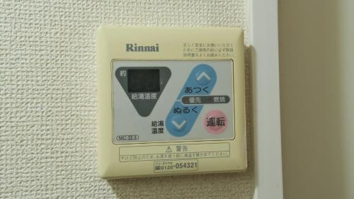a small electronic device attached to a wall at 5mins walk to Kameari Station within 30mins to Ginza, Asakusa, Skytree Direct bus to Haneda Airport & Tokyo Disneyland departing from Kameari Station in Tokyo