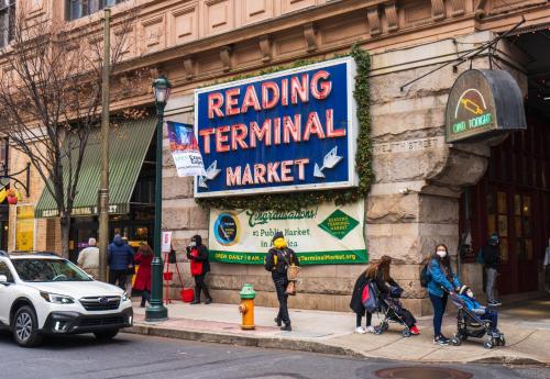 a building with a sign for aemed terminal market at Holiday Inn Express Philadelphia-Midtown by IHG in Philadelphia