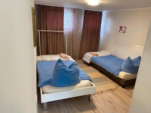 Ein Bett oder Betten in einem Zimmer der Unterkunft Green wonder
