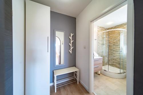 a bathroom with a shower and a sink at Apartments Casa Barbara in Rab