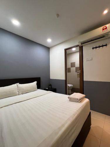 Postel nebo postele na pokoji v ubytování Hotel Miju