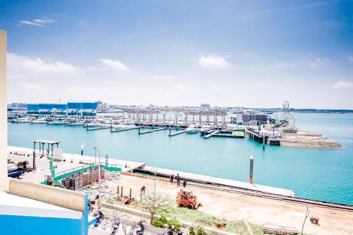 a view of a harbor with a marina at Penghu Sea Residences Hall in Magong