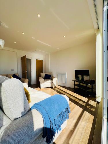 Гостиная зона в Stunning 2 bedroom flat for 5 people overlooking the sea 2A