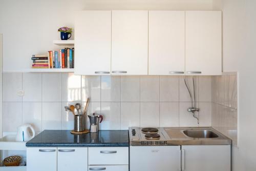 Balcony apartment with a sea view in town center