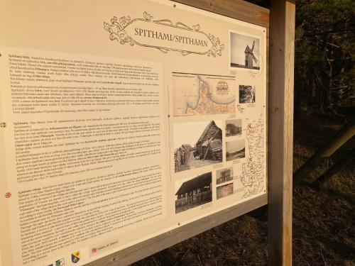 a sign for a museum with pictures of the pyramids at Black House Spithami in Spithami