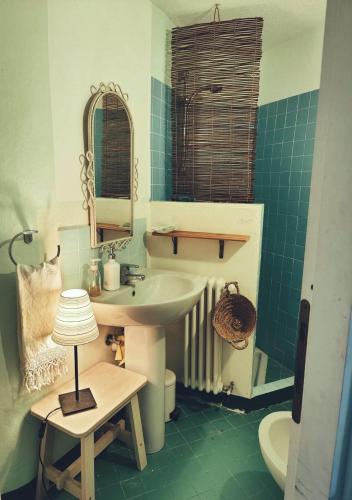 a bathroom with a sink and a mirror at Casalago in Domaso