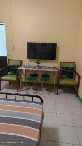 TV a/nebo společenská místnost v ubytování Waray WaRaE Haven
