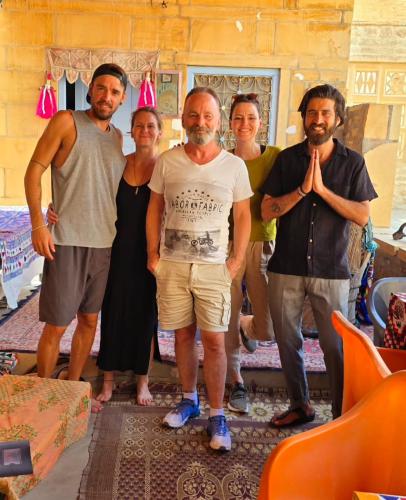 a group of people posing for a picture at Marigold Home Stay in Jaisalmer