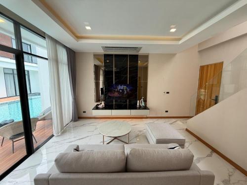 Χώρος καθιστικού στο Unique Beach Style 3 Bedroom Villa with Mega Pool