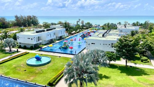 an aerial view of a pool at a resort at Serene Phla Resort and Restaurant in Rayong