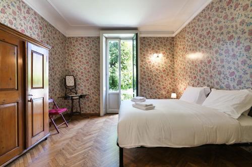 Posteľ alebo postele v izbe v ubytovaní Villa Frascati with garden - City Life