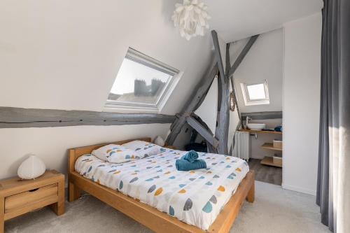 En eller flere senge i et værelse på La Goélette - Entre Port & Plage - Cosy