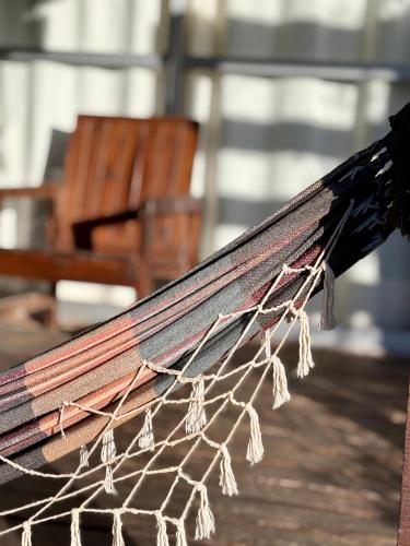 a close up of a net with a bench at Monoambiente en Valizas in Barra de Valizas