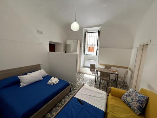 Una cama o camas en una habitación de La casetta mare e monti