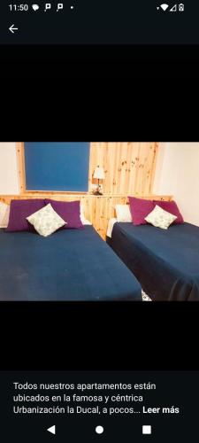 Ένα ή περισσότερα κρεβάτια σε δωμάτιο στο Apartamento 1ª linea by Hugo Beach Hotel - Mayores de 25