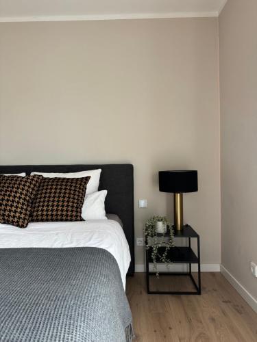 Una cama o camas en una habitación de Sonniges Design-Apartment nahe Hamburg - Ruhe, Komfort & kostenloses Parken