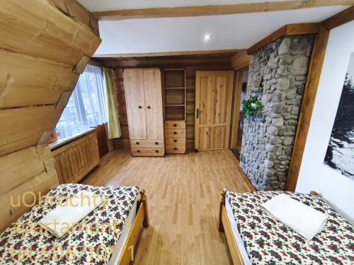 Postel nebo postele na pokoji v ubytování U Obrochty