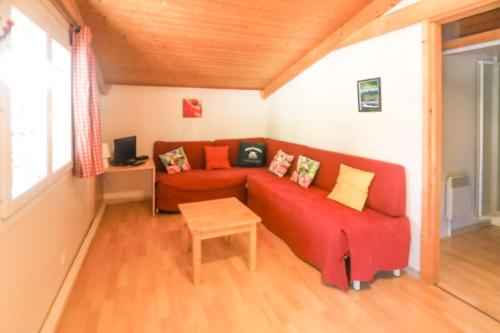 Posezení v ubytování Chalet bois tout équipé 35 m2 2 chambres terrasse couverte place parking piscine collective 4 personnes
