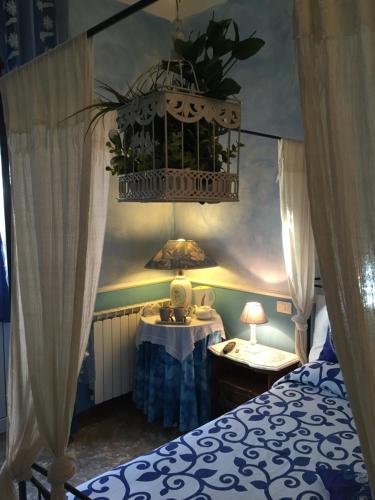 Ένα ή περισσότερα κρεβάτια σε δωμάτιο στο B&B Casa Celsi