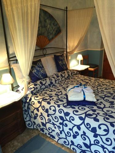 Ένα ή περισσότερα κρεβάτια σε δωμάτιο στο B&B Casa Celsi