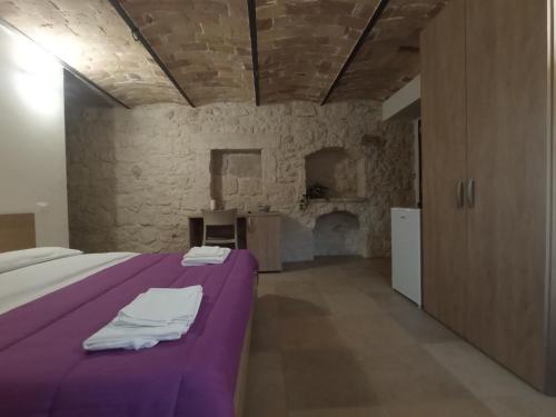Postel nebo postele na pokoji v ubytování Residence la ramosciana