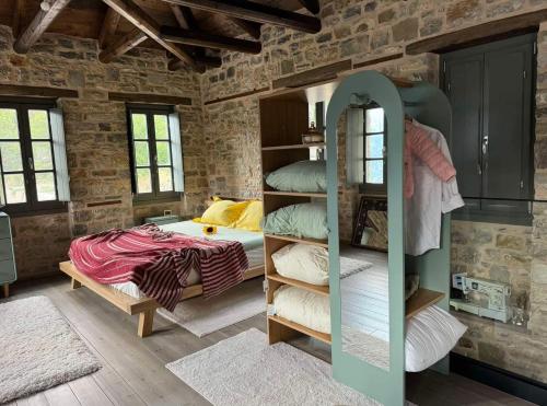 En eller flere senge i et værelse på Χελιδόνα - Helidona