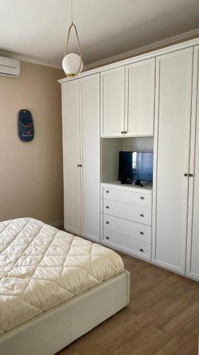 Postel nebo postele na pokoji v ubytování NT tourist accommodation