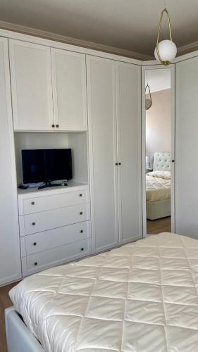 Postel nebo postele na pokoji v ubytování NT tourist accommodation