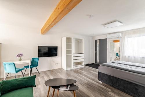 Katil atau katil-katil dalam bilik di Luxus Appartement Motel Ambiente 3