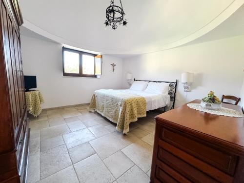 Katil atau katil-katil dalam bilik di Masseria Pilano