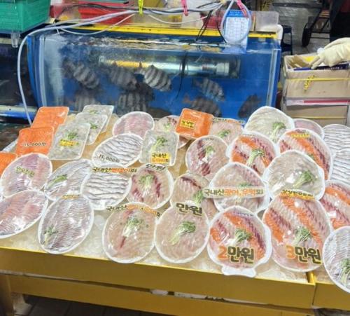 a bunch of plastic bags of food on a table at Near Incheon airport, China town, Songdo, Inha Uni Hospital in Incheon